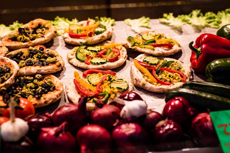 Vegetarian supreme pizza with colorful vegetables