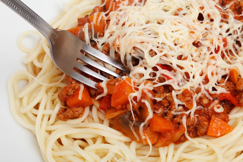 Spaghetti bolognese with rich meat sauce and parmesan